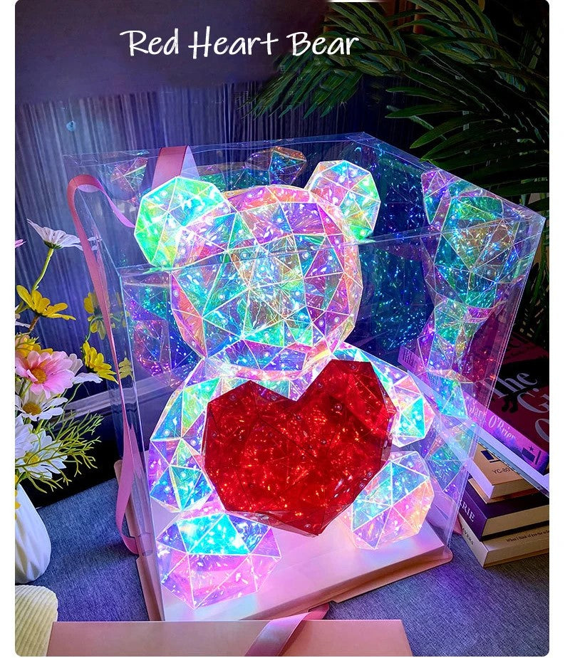 Crystal LED bear with red heart in clear gift box, glowing with rainbow lights
